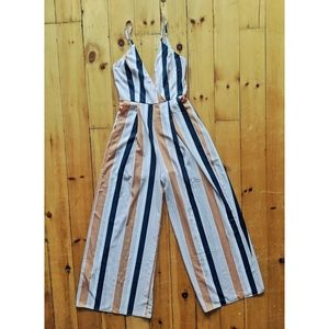 Striped strappy jumpsuit with front split legs.